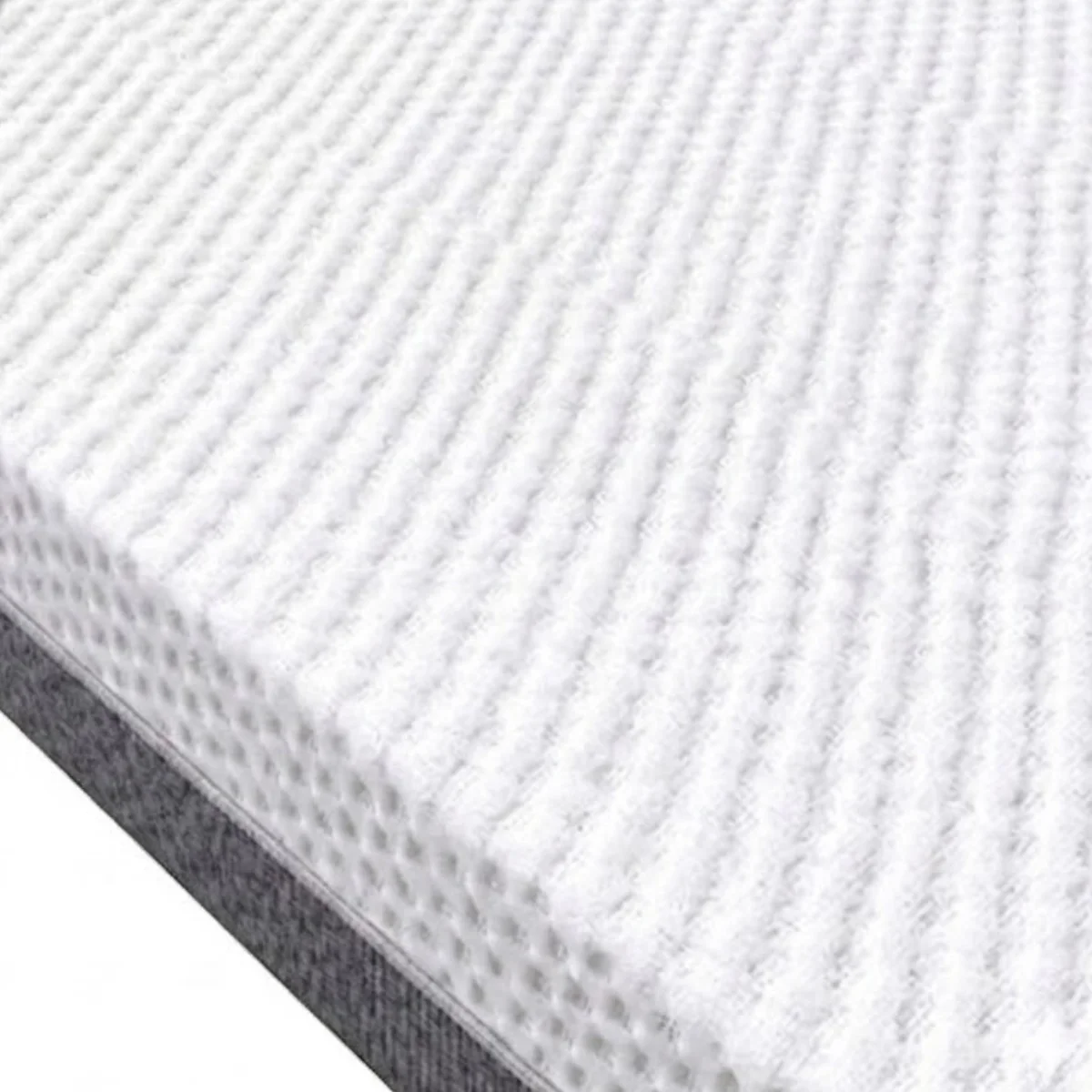 Détail mousse haute résilience D30 et surmatelas soft – Matelas Harmonie Atlas Matelas